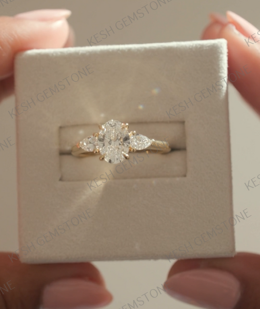 4.60 Ct Oval Trilogy Diamond Engagement Ring with Pear Side Stones in 14K Gold Plated 925 Silver