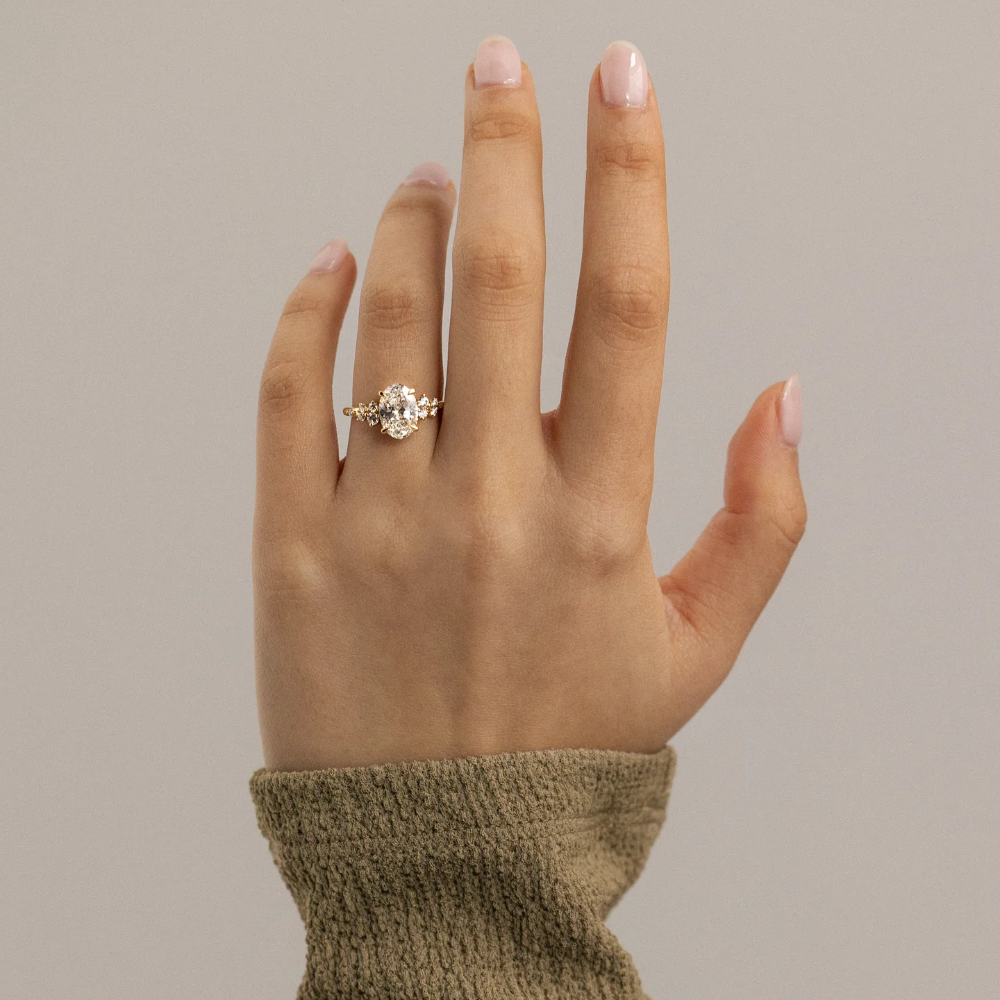 4.53 Ct Oval Cut White Diamond Ring with Side Clusters | F Color VS1 | 925 Silver with 14K Gold Plating
