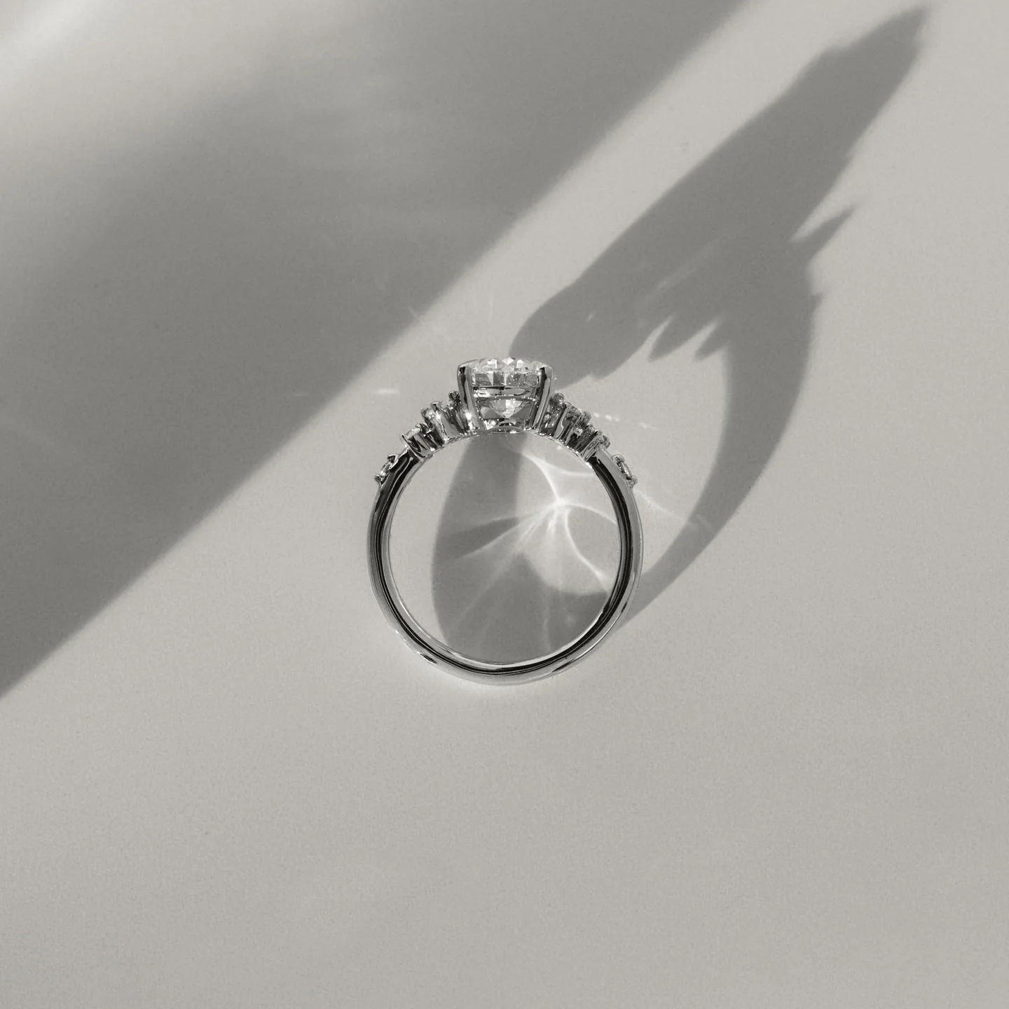 4.53 Ct Oval Cut White Diamond Ring with Side Clusters | F Color VS1 | 925 Silver with 14K Gold Plating
