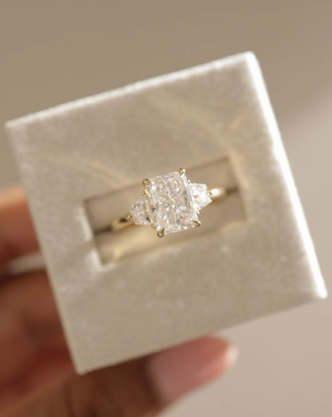 4.61 Ct Radiant Cut White Diamond Ring with Trapezoid Side Stones in 14K Gold Plated 925 Silver