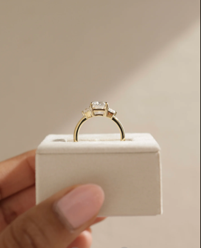 4.61 Ct Radiant Cut White Diamond Ring with Trapezoid Side Stones in 14K Gold Plated 925 Silver